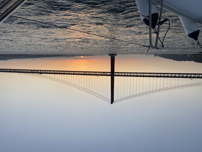 Lisbon: Tagus River Sailboat City Cruise - The south bank and Christ the King views: finishing with payoff