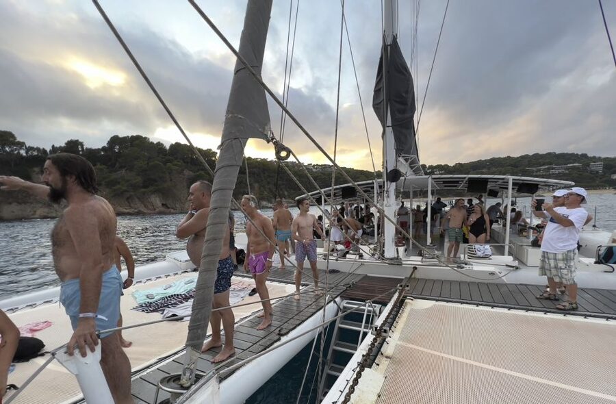 Lloret de Mar: Sunset Catamaran Cruise with DJ and Drinks - The swim stop: a calm inlet break (and how to be ready)