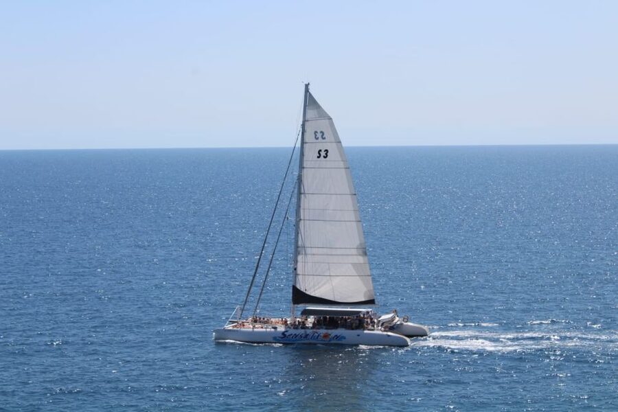 Lloret de Mar: Sunset Catamaran Cruise with DJ and Drinks - Meeting at the promenade and what you should bring