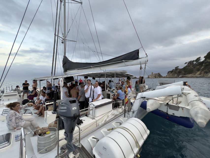 Lloret de Mar: Sunset Catamaran Cruise with DJ and Drinks - Should you book this Lloret de Mar DJ catamaran cruise?