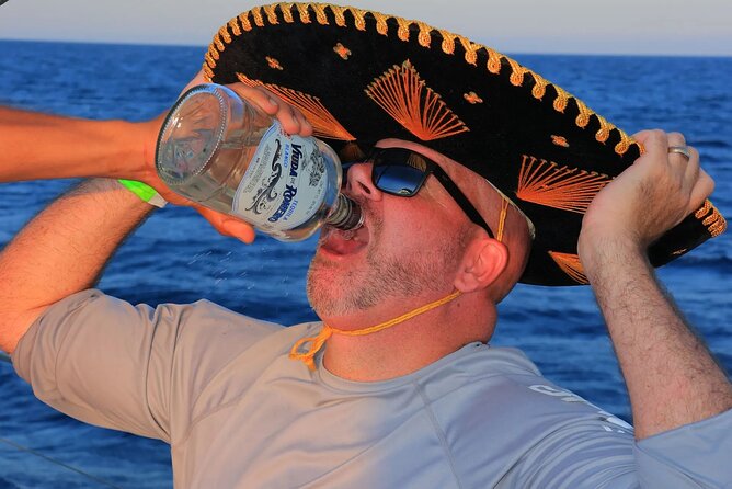 Los Cabos Catamaran Cruise with Open Bar & Light Snack - Divorce Beach and Cabo San Lucas Beach: Seeing the Shore Without the Crowds