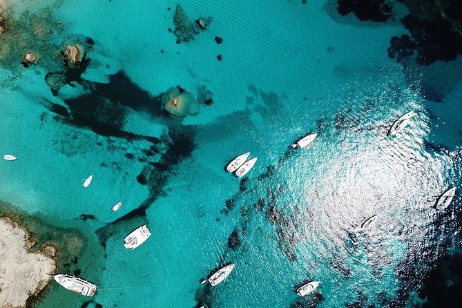 Luxury catamaran from Porto Rafael-Palau to the Maddalena Archipelago - Razzoli and Santa Maria: cliffs, a convent, and the Porto Madonna lagoon