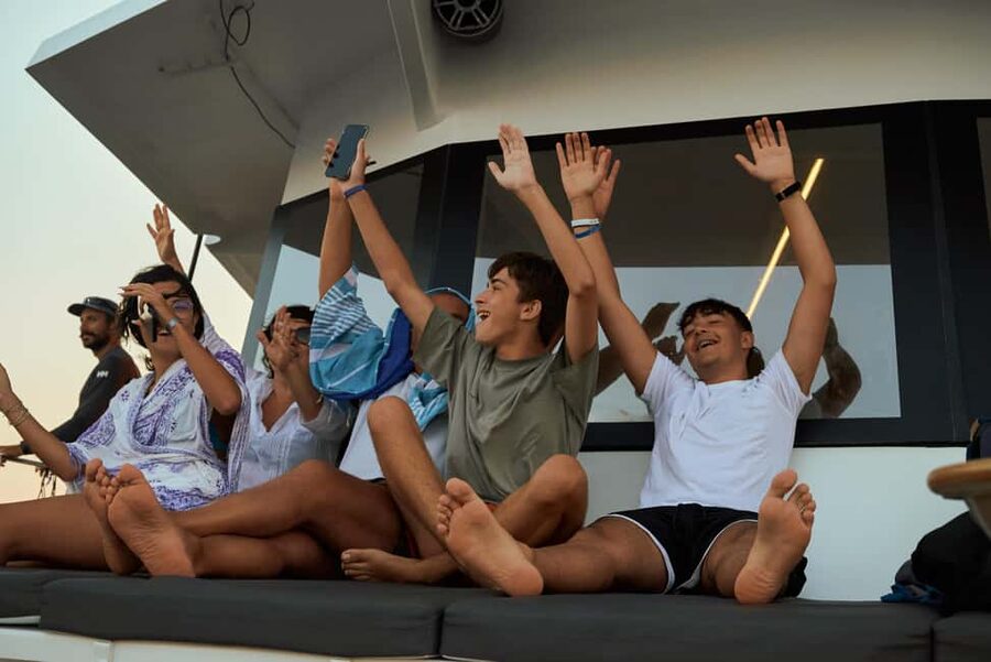 Luxury Catamaran to Balos: Sunset, Snacks, Drinks & Transfer - The catamaran comfort: sunbeds, shade, and the VIP upgrade logic