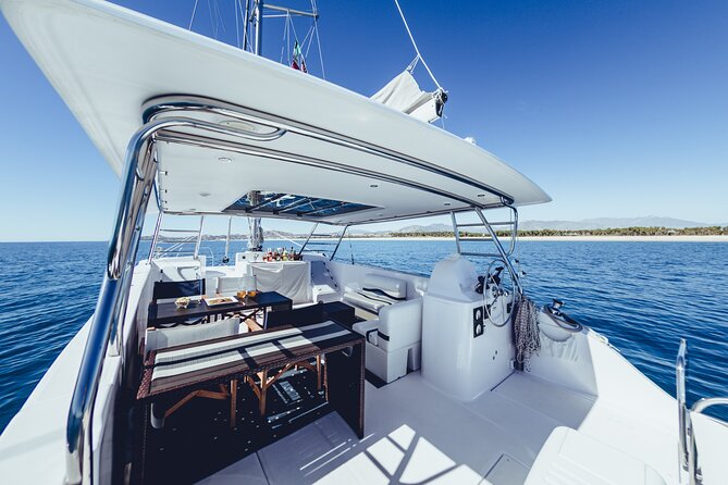 Luxury Whale Watch Cruise to The Arch Los Cabos - Comfort on the water: open bar, shade spots, snacks, and choppy-water reality
