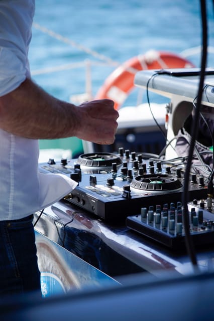 Malaga: Catamaran Sailing Cruise with Swimming & Optional DJ - Optional Live DJ: Pick Your Vibe Before You Board