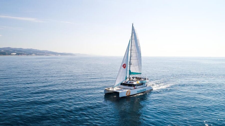 Malaga: Sailing Catamaran with Swimming and Paella Lunch - Boarding and the boat setup: deck comfort and optional net seating