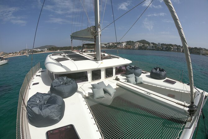 Mallorca Catamaran Tour with Tapas - small group - - The 4.5-hour plan: coastline cruising, then Camp de Mar (or Cala Blanca)