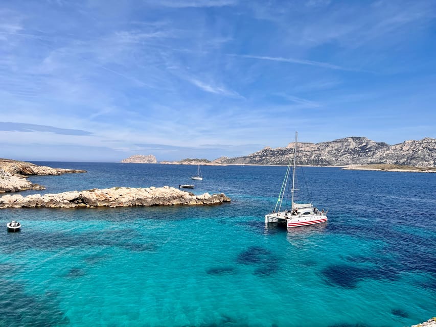 Marseille: Calanques Catamaran Cruise, Picnic, & Swimming - Calanque de Sormiou: cliff drama and guided sightseeing (time on the schedule)