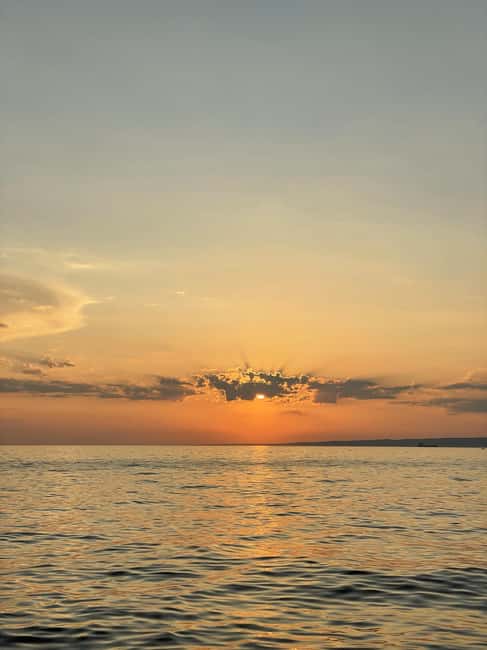 Marseille: Evening sailboat trip to the Calanques du Frioul with buffet and organic wine - The Anchor Stop at the Frioul Archipelago: Swim, Snorkel, Sunset