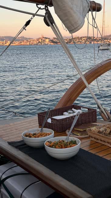 Marseille: Evening sailboat trip to the Calanques du Frioul with buffet and organic wine - When You Depart: High vs. Low Season Timing That Actually Changes Your Day