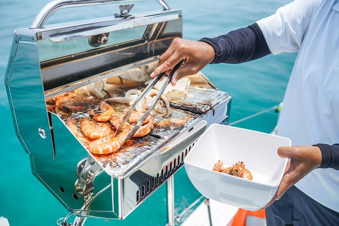 Mauritius: Catamaran Cruise to Ile Aux Cerfs with BBQ Lunch - The onboard BBQ lunch and local drinks: full value if you pace yourself