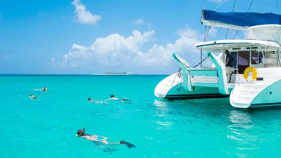 Mauritius: Ile Aux Cerfs Catamaran Trip w/ Lunch & Transfer - Sailing the East Coast Lagoon: Crystal Water and a Real Break