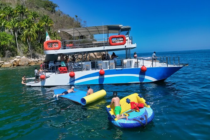 Mega Catamarans ALL INCLUSIVE Remote Paradise Beach Adventure - The return cruise to Puerto Vallarta: music, dancing, and wildlife luck