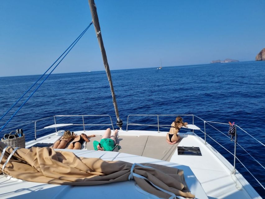 Milos: Full-Day Catamaran Cruise with Food and Open Bar - A Milos and Poliegos catamaran day that actually feels like a day at sea
