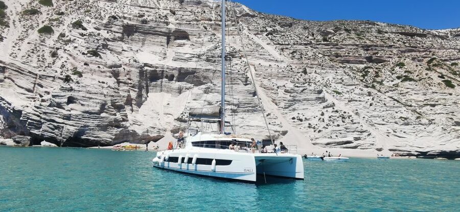 Milos: Full-Day Catamaran Cruise with Food and Open Bar - Sykia Cave and more coastal passes: photo time with myth-style commentary