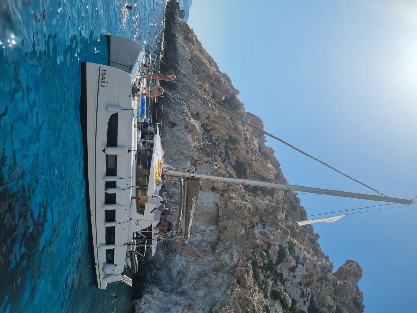Milos: Full-Day Catamaran Cruise with Food and Open Bar - Gerakas Beach: swimming time plus lunch fuel