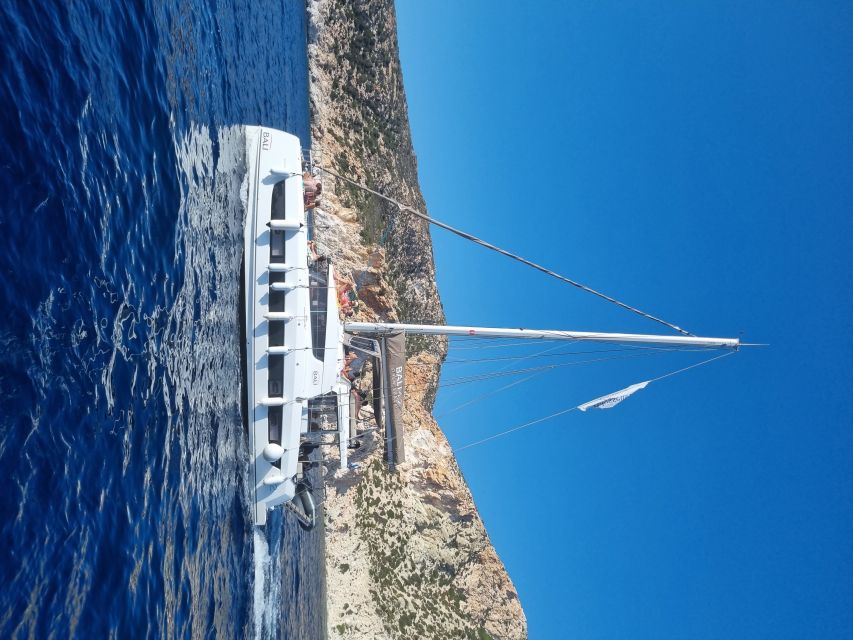 Milos: Full-Day Catamaran Cruise with Food and Open Bar - Sarakiniko, Klima, Skinopi, and the late-day photo circuit