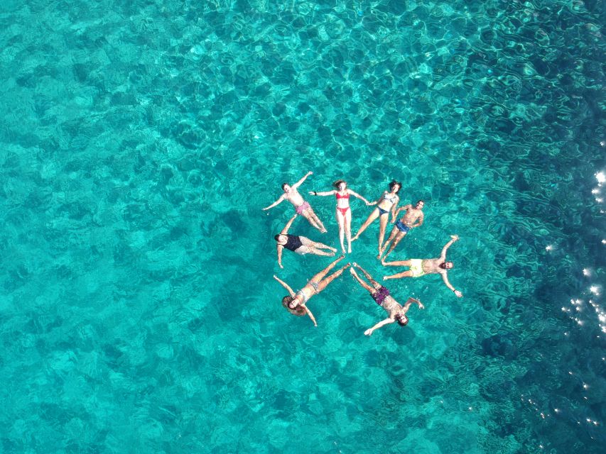 Milos: Full-Day Catamaran Cruise with Paddle Board - Saint Dimitrios: one last swim with a view over Plaka and Tripiti