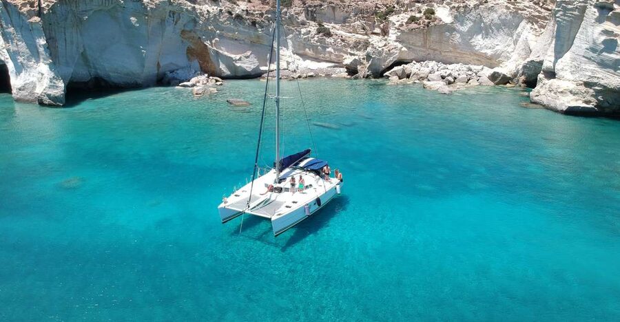 Milos: Full-Day Catamaran Cruise with Paddle Board - Starting at Adamas: catacombs, Klima, and the rocks you’ll remember
