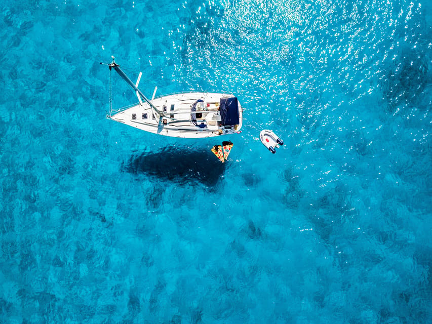 Milos: Full-Day Kleftiko Poliegos Sailboat Tour with Lunch - Getting Oriented: Adamas Launch Points and Weather-Based Routes
