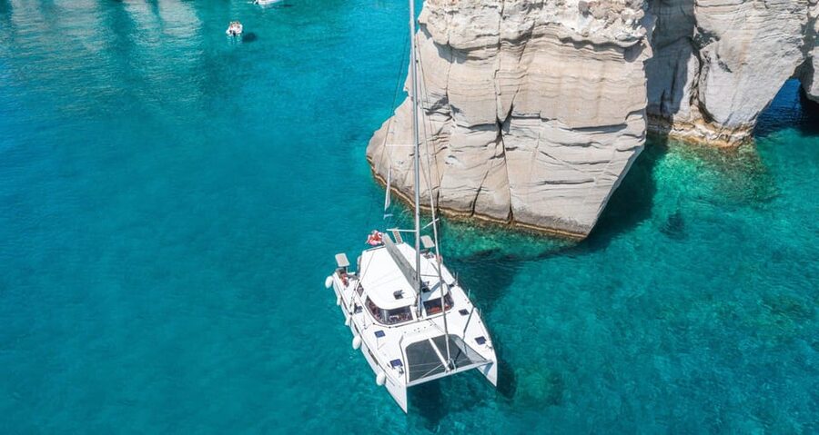 Milos: Kleftiko Morning Catamaran Cruise with Lunch & Drinks - The scenic sail past Klima, and why those boathouses matter