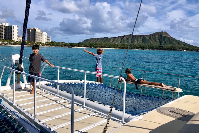 Moana’s Swim’n’Sail Cocktail Cruise Along the Waikiki Coast - The swim time off the board: clear water, float belts, and a flexible approach