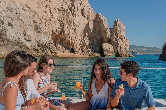 Multimillion Yacht Cabo Cruise Sunset or Snorkel Optional PICKUP! - Onboard vibe: open bar, music, and a crew that sets the mood