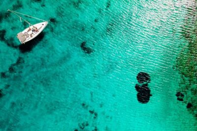 Mykonos 6hrs sailing cruise: Delos Rhenia with lunch & transfer - Rhenia (Rhineia): crystal water, snorkeling gear, and time to play