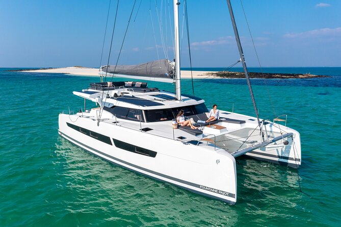Mykonos: Brand-New Catamaran Cruise with Meal, Drinks & Transport - Mykonos Catamaran to Rhenia: Why This Day Trip Works