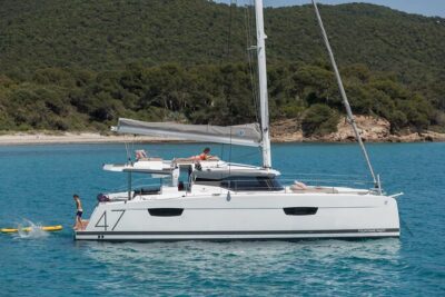 Mykonos: Brand-New Catamaran Cruise with Meal, Drinks & Transport - Rhenia Stop: Swimming, Snorkeling, and Choosing Your Own Pace