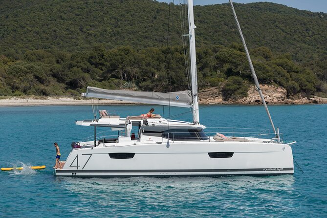 Mykonos: Brand-New Catamaran Cruise with Meal, Drinks & Transport - Rhenia Stop: Swimming, Snorkeling, and Choosing Your Own Pace