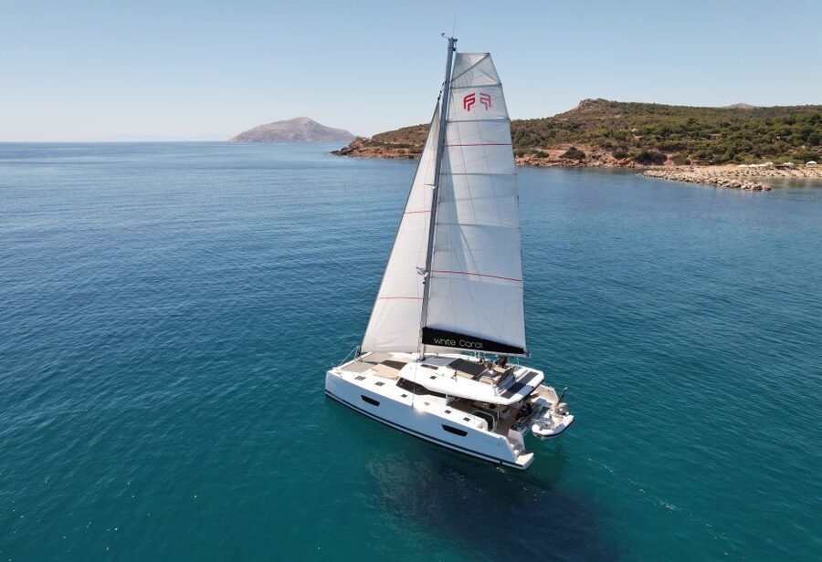 Mykonos: Catamaran Cruise with 3-Course Meal and Transfers - Rhenia vs. the Mykonos south coast: what changes your day