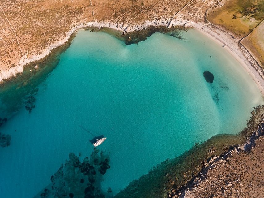 Mykonos: Catamaran Cruise with Lunch, Drinks and Transfer - Entering Mykonos from the sea: why Rhenia feels like a reset
