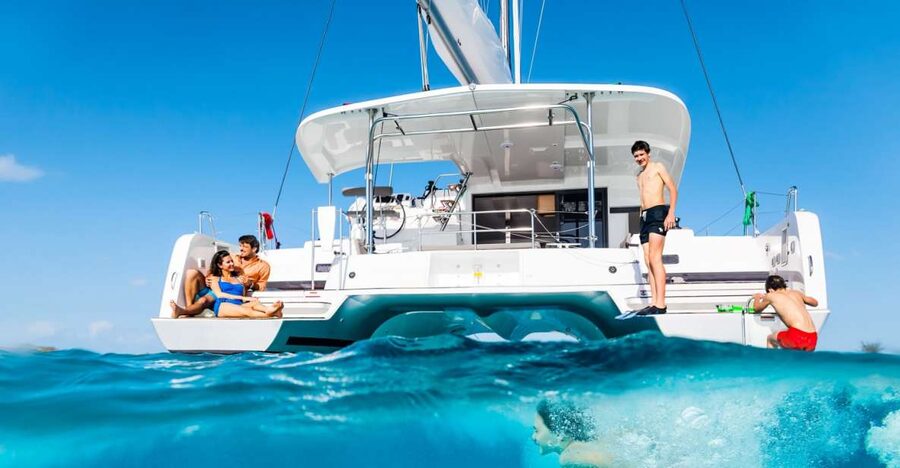 Mykonos: Catamaran Cruise with Lunch, Drinks and Transfer - Lunch onboard and unlimited homemade rosé: how the food and drinks work