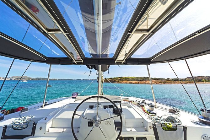 Mykonos Catamaran Premium Day-Sunset Tours 8-flavor Meal & Drinks - Sailing to Rhenia: the water-play portion that drives the day