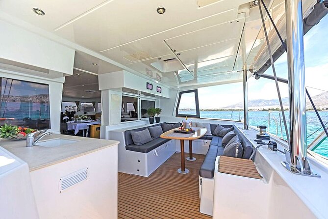 Mykonos Catamaran Premium Day-Sunset Tours 8-flavor Meal & Drinks - Delos from the water: when you get the Apollo-Artemis photo stop
