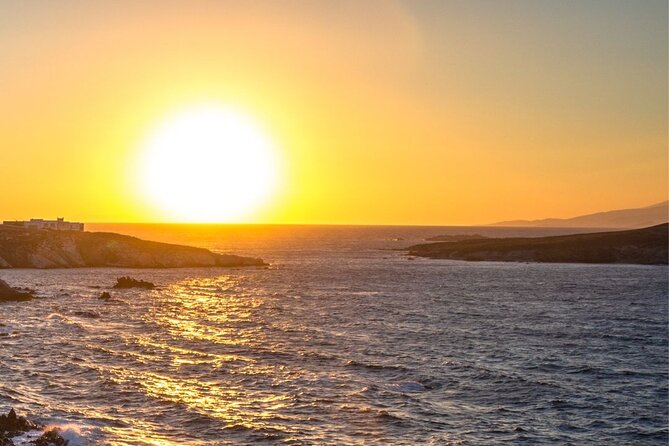 Mykonos Catamaran Sunset Cruise with Meal, Drinks & Transfer - Super Paradise Beach: Swim-Friendly Views and a More Electric Atmosphere