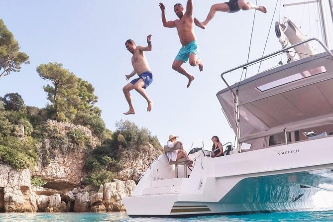 Mykonos Shared Catamaran Tour Experience - Delos ruins: the boat view and what the crew typically points out