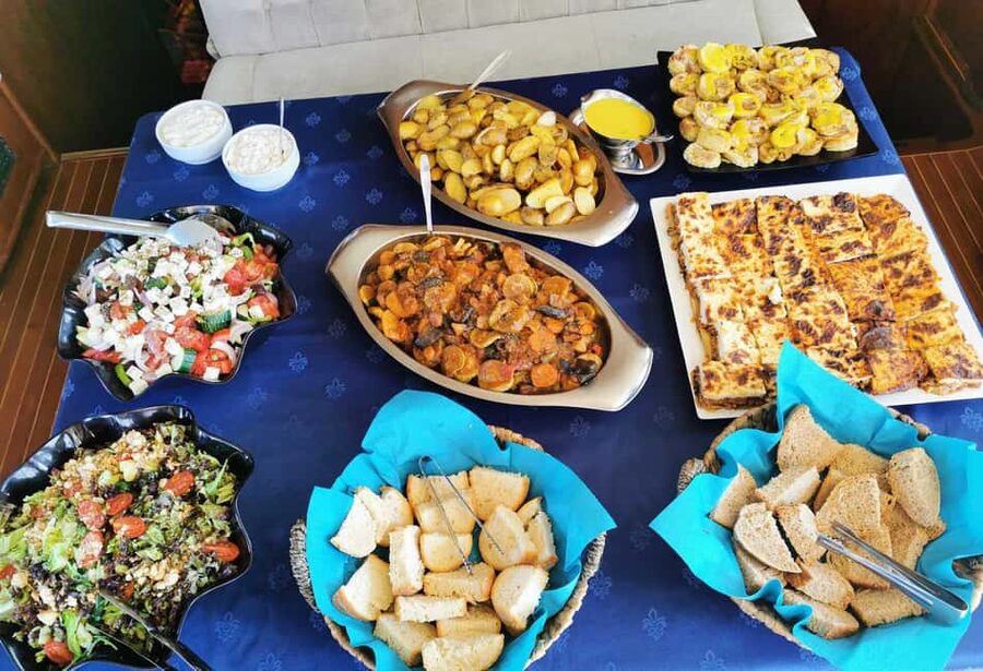Mykonos: Sunset Sail Cruise to Rhenia, Beach Hopping, Dinner - Rhenia swim and snorkel: what makes it special