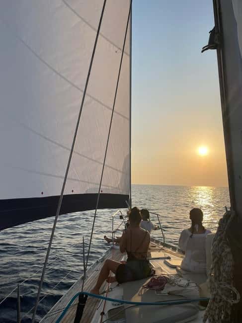 Mykonos: Sunset Sail Cruise to Rhenia, Beach Hopping, Dinner - Sunset viewing on the return: the Aegean gets the last word