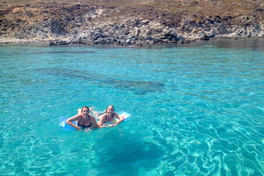 Mykonos: Yacht Cruise to Rhenia and Guided Tour of Delos - Rhenia Bay: Anchored Swim Time, Snorkeling Gear, and Lunch Onboard