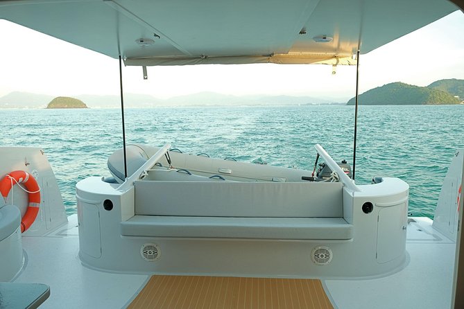 New Power catamaran for Phang Nga and Phi Phi island excursions - Crew professionalism: Flo, Steve, Glenn, Sunee, Milk, and Em