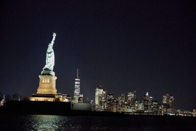 NYC: City Lights Yacht Cruise with Drink Included - The night route: from Lower Manhattan glow to the Statue of Liberty area