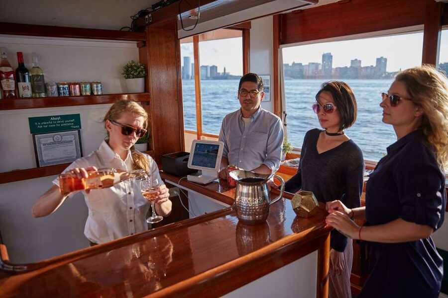 NYC: Sunset Cruise on a Small Yacht with a Drink - How to Choose Your Spot: Open Bow vs. Glassed-In Cabin