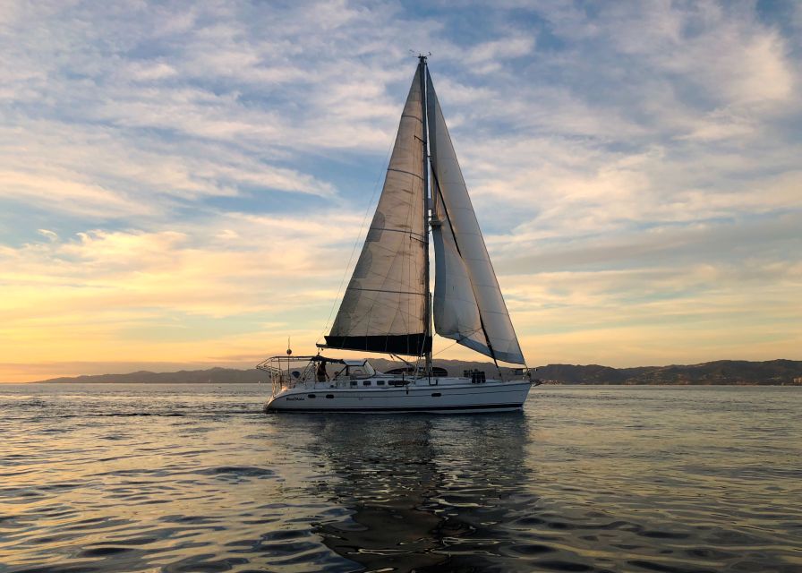 Nydri: Full-Day Sailing Cruise with Swim Stops & Meal - Skorpios: a photo stop that turns into snorkeling time