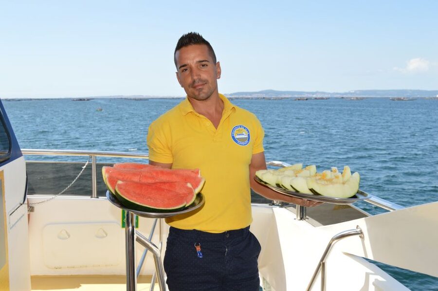 O Grove: Ría de Arousa Catamaran Tour with Seafood Lunch - The seafood lunch menu: mussels, oysters, shellfish rice, and fruit