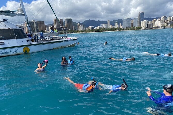 Oahu Catamaran Snorkel Tour: See Turtles 100% Guaranteed - Waikiki pier to the reef: how the ride and stops work