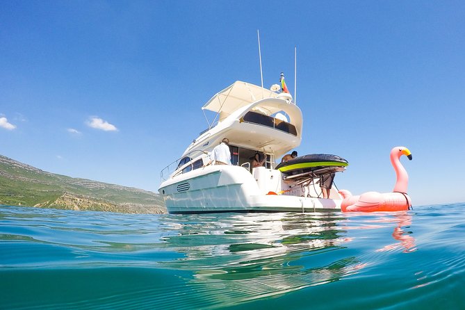 Ocean Bliss: Full Day Arrábida Private Yacht Tour from Lisbon - Arrábida Natural Park: 4 Hours of Protected-Coast Sailing and Views
