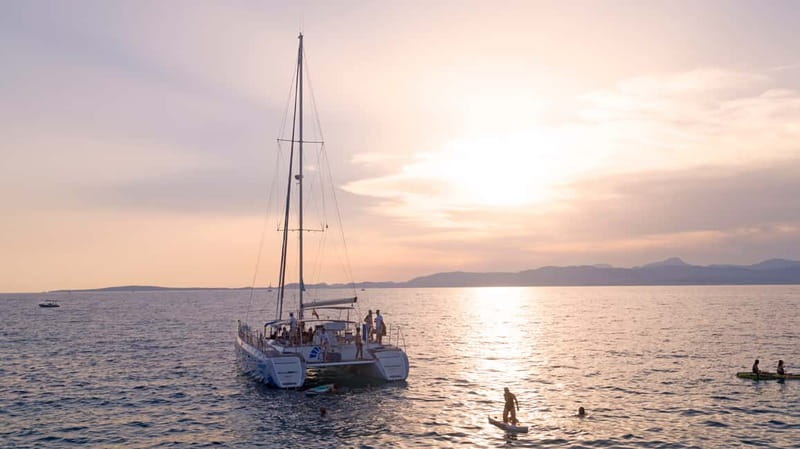Palma de Mallorca: Deluxe Catamaran Sailing Tour with Meal - Cala Vella swim stop: turquoise water plus optional gear time