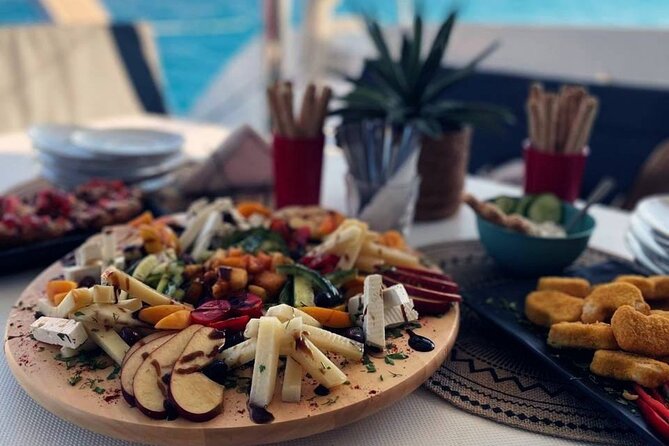 Panormo: Luxury Sunset Catamaran Cruise Sushi & Open Bar - Where Panormo’s sunset cruise starts: DanEri’s catamaran and the boarding flow